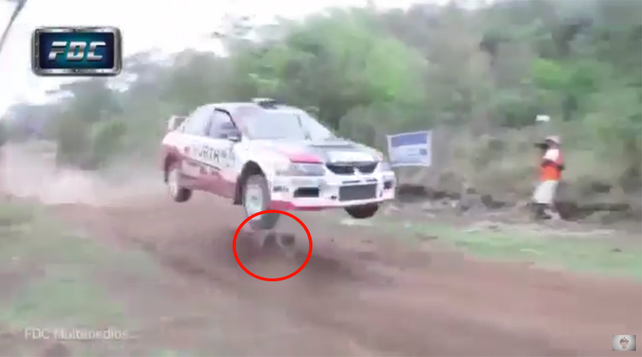 Lucky is as lucky does! Dog has incredible near miss on racetrack (VIDEO)
