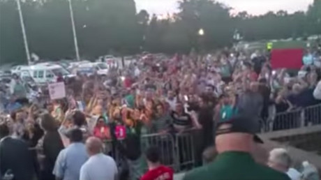 A crowd gathered in Sterling Heights, Michigan, cheers for the city planning commission's rejection of a mosque in September 2015. © SanVic