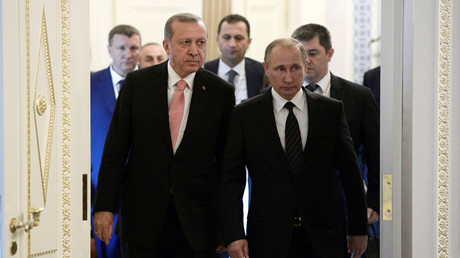 Russian President Vladimir Putin (R) and Turkish President Tayyip Erdogan enter a hall during their meeting in St. Petersburg, Russia, August 9, 2016. © Alexei Nikolsky