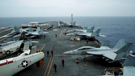 F/A-18 Hornet fighter jets and E-2D Hawkeye plane are seen on the U.S. aircraft carrier John C. Stennis © Nobuhiro Kubo