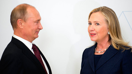 FILE PHOTO: U.S. Secretary of State Hillary Clinton (R) talks with Russia's President Vladimir Putin during the arrival ceremony for the Asia-Pacific Economic Cooperation (APEC) Summit in Vladivostok, Russia, September 8, 2012 © Jim Watson