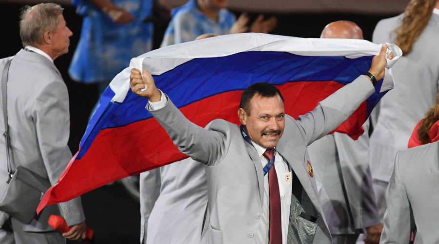 IPC revokes Paralympic accreditation of Belarus official who carried Russian flag