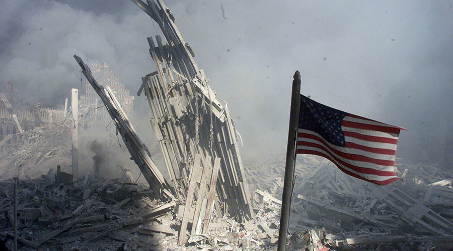 Am American flag flies near the base of the destroyed World Trade
Center in New York, September 11, 2001. © Peter Morgan