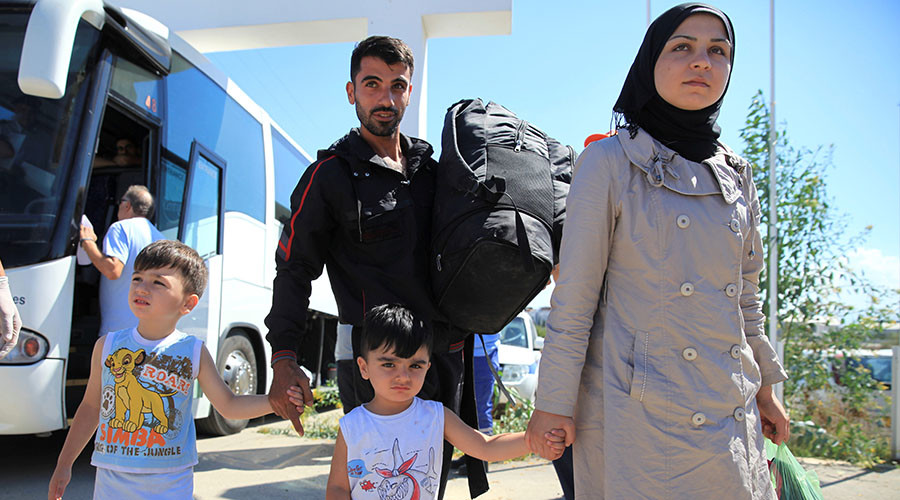 Help reunite refugee families, 200 faith leaders tell Theresa May