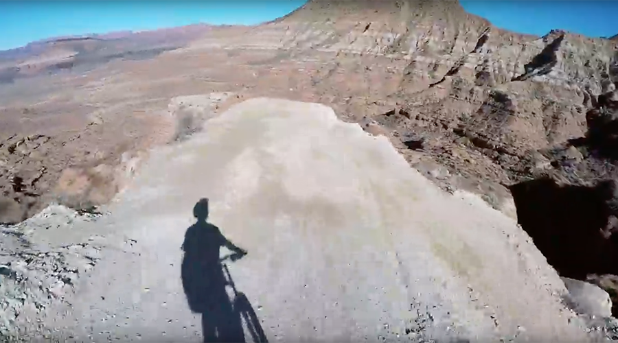 Helmet cam captures mountain biker’s death defying desert jump (VIDEO)