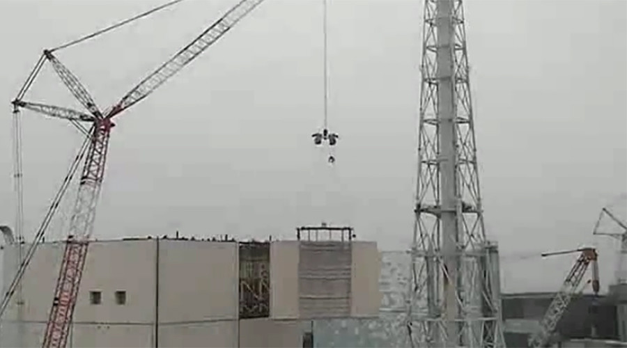 TEPCO dismantles safety wall around crippled Fukushima reactor building (VIDEO)
