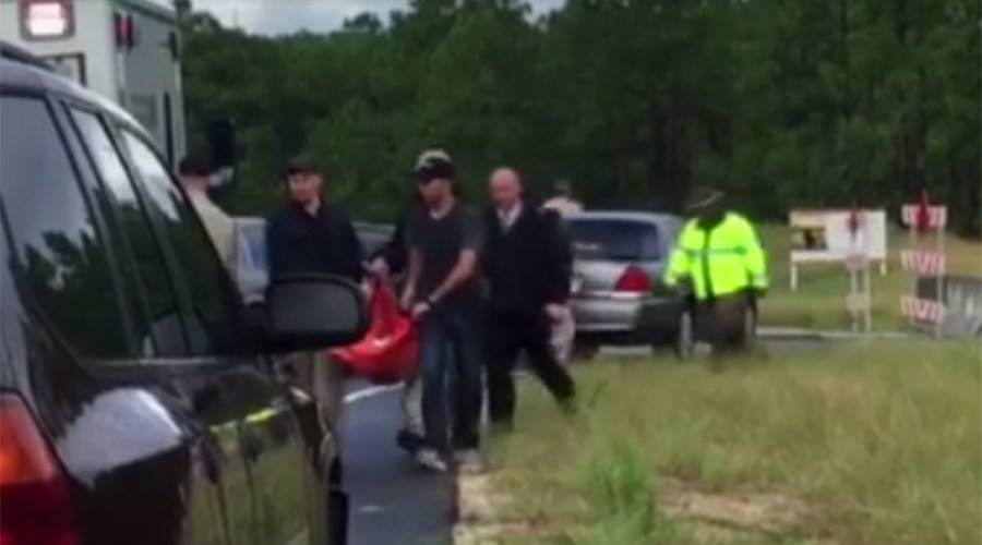 'We beat the odds': Abducted 6yo girl found alive & chained to tree, man in custody