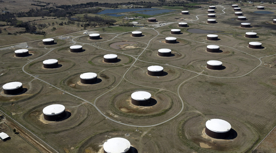 Oil prices slide on oversupply pessimism