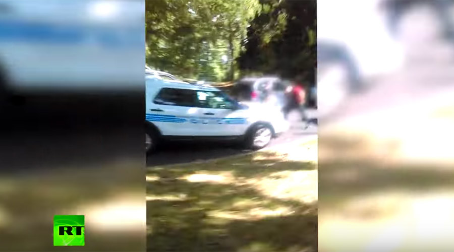 'He doesn't have a gun!' Keith Scott's wife releases footage of fatal shooting (VIDEO)