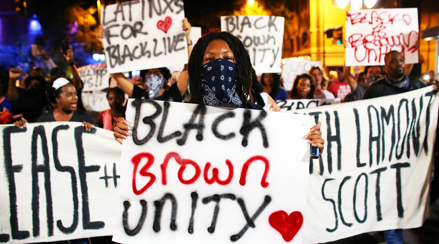 Charlotte protesters march on highway in 4th night of demonstrations