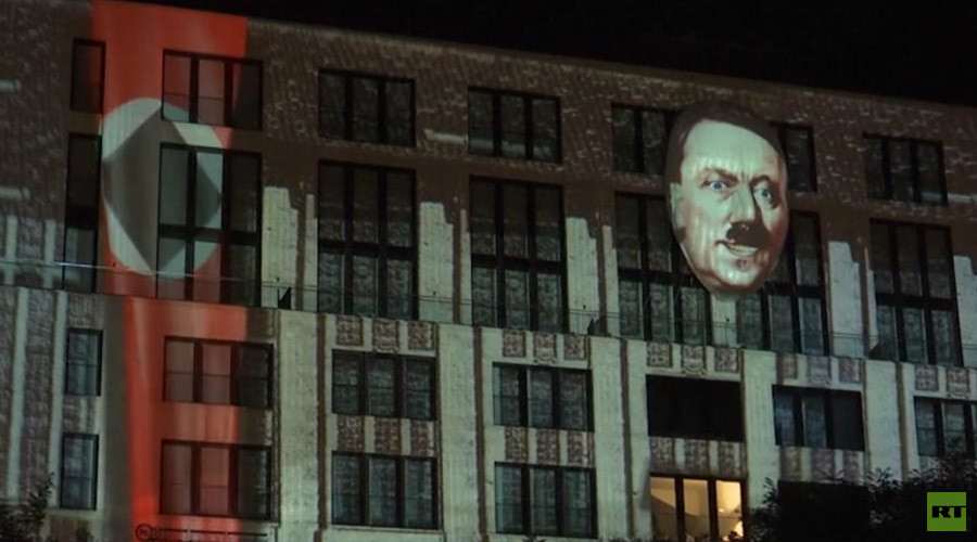 Controversial Hitler installation illuminates building in Berlin (VIDEO)