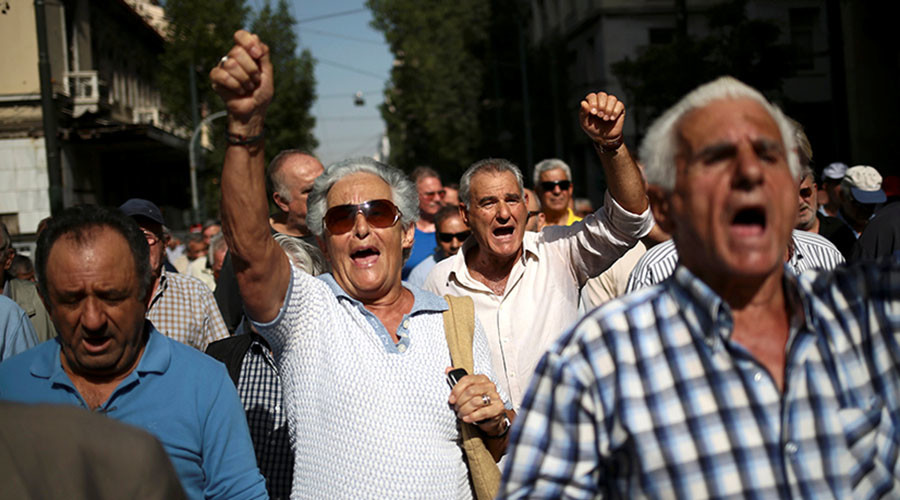Greek pensioners rock police bus at Athens protest, tear-gassed in return (PHOTOS, VIDEOS)
