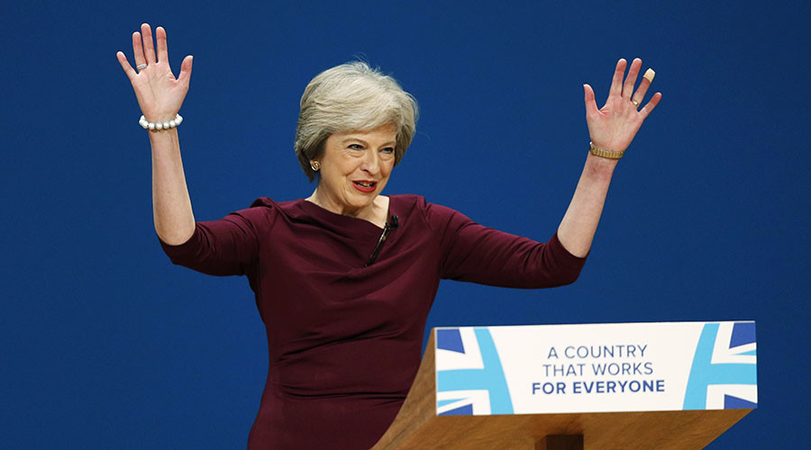 Tories are ‘party of the workers,’ says Theresa May... while wearing £800 outfit