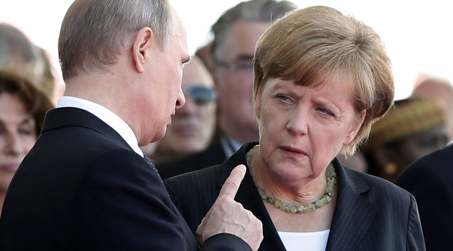 Russian President Vladimir Putin talks with German Chancellor Angela Merkel. File photo. © Kevin Lamarque