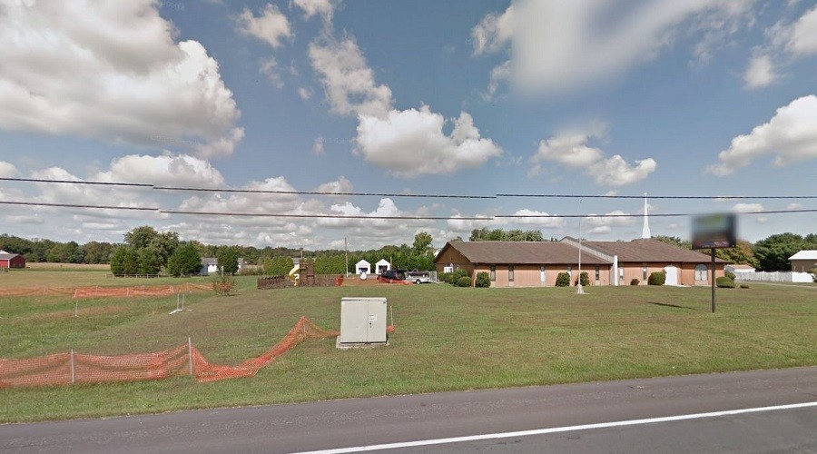 Church faces daily $100 fine for housing homeless on its lot, battles with neighbors