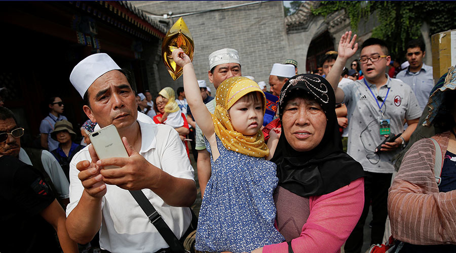 Parents in majority Muslim region of China banned from ‘luring’ children into religion