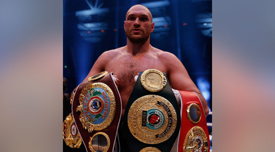 Tyson Fury voluntarily gives up world titles