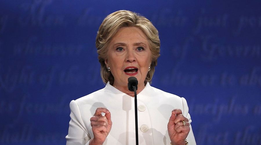 Clinton shifts debate away from WikiLeaks revelations by blaming Putin for cyberattacks
