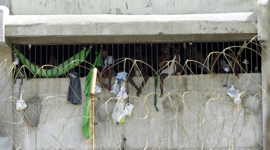 Big prison break: 174 inmates kill guard, steal guns, flee Haiti prison