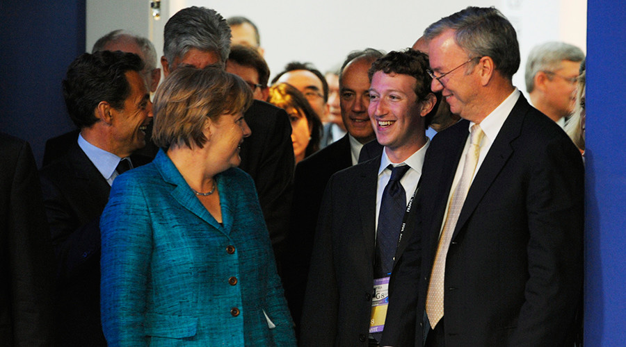 FILE PHOTO: German Chancellor Angela Merkel speaks with Facebook founder and Chief Executive Officer Mark Zuckerberg (C) and Google CEO Eric Schmidt(R) at the G8 Summit in Deauville May 26, 2011 © Philippe Wojazer