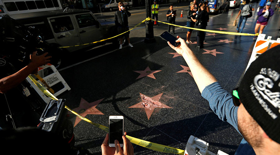 Trump’s Walk of Fame star smashed with a sledgehammer (VIDEO)