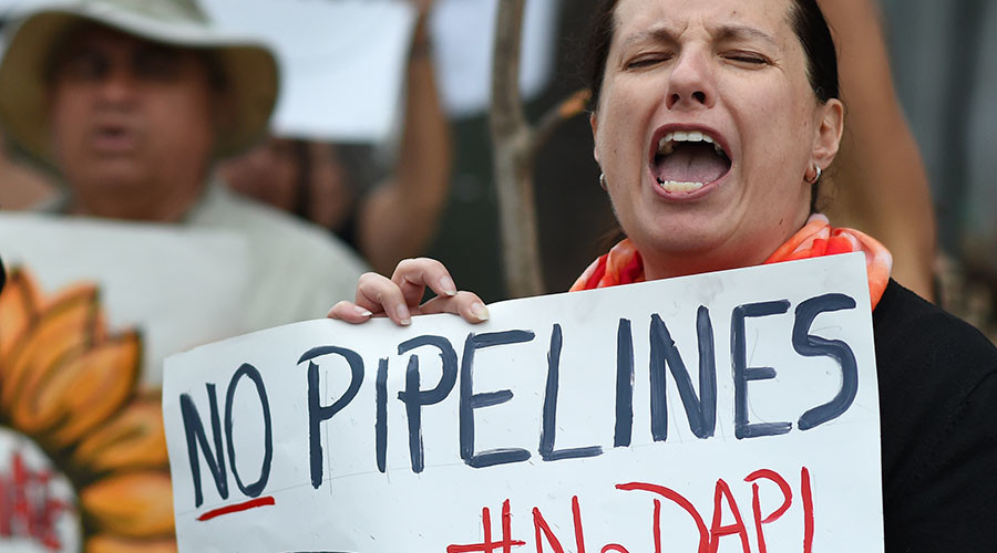 Police warn of eviction 'at any time' as Dakota Access protesters refuse to leave private land