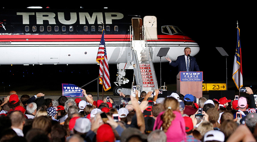 Trump mistakes black supporter for 'thug' and removes from rally (VIDEO)