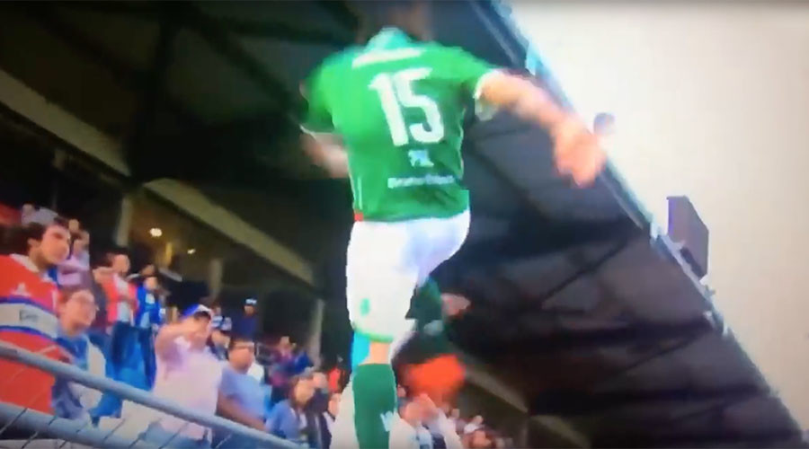 Furious footballer faces jail after attack on rival fan in South America (VIDEO)