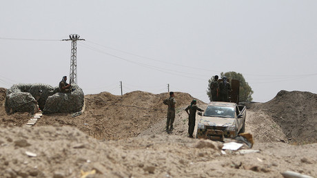 Fighters of the Syria Democratic Forces take positions in northern province of Raqqa, Syria © Rodi Said