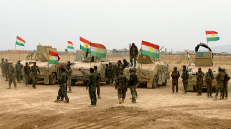 Kurdish Peshmerga military vehicles are seen during a battle with Islamic State militants at Jarbuah village near Bashiqa near Mosul, Iraq October 28, 2016. © Ahmed Jadallah