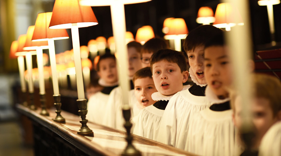 Choristers from St. Paul's Cathedral choir sing at the Quire inside St. Paul's Cathedral in London, Britain. © Dylan Martinez