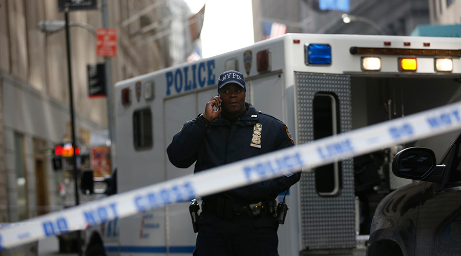 One NYPD officer dead, another wounded in robbery shootout