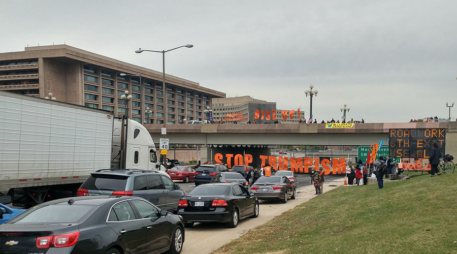 Anti-Trump, anti-TPP protesters block DC highway