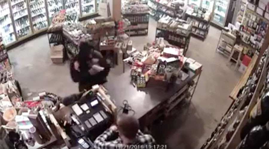 LA shop owner fights off gun-wielding robber (VIDEO)