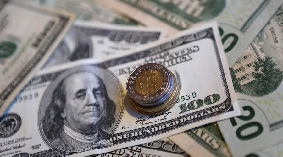 Dollar hovers around 14yr high closing in on parity with euro