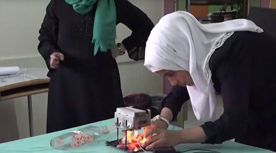 Bright idea: Gaza teen generates electricity from candles to overcome power cuts (VIDEO)