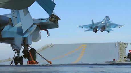 Su-33 fighter takes off from the deck of Admiral Kuznetsov aircraft carrier near the Syrian coast in the Mediterranean Sea. © Russian Ministry of Defense 