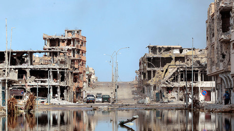 FILE PHOTO: A view of a street in the devastated area where former Libyan leader Muammar Gaddafi was hiding out in Sirte October 22, 2011 © Thaier al-Sudani 