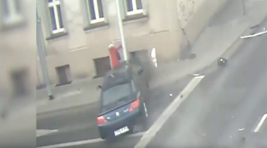Nerve-shredding footage shows lamp post save woman from runaway car (VIDEO)