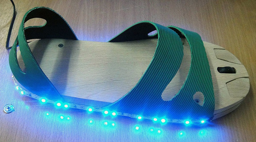 Russian teen invents LED ‘mouse-sandal’ for people who have no hands