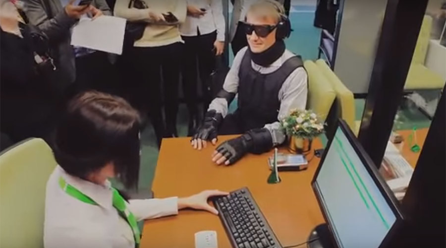 Russian bank chief causes Twitter frenzy after showing up to check service in ‘disabled costume’