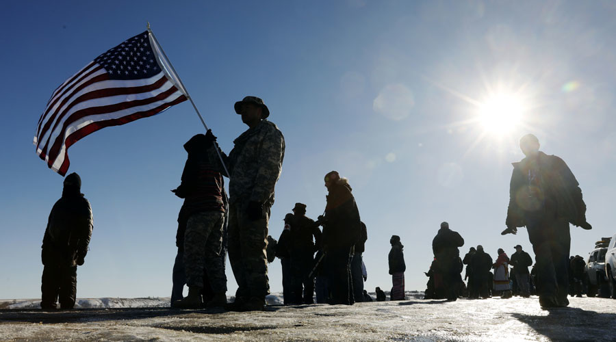 After Dakota Access Pipeline victory, veterans headed to Flint