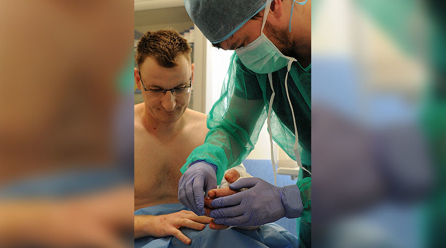 Man born without left hand gets one in ‘first-of-its-kind’ surgery in Poland
