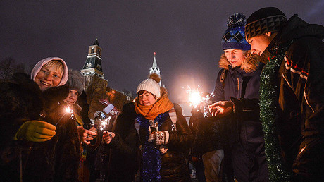 City residents and visitors to Moscow celebrate New Year's Eve on Vasilyevsky Spusk, Moscow. © Eugene Odinokov