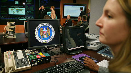 A worker at the National Security Agency (NSA) sits at her computer terminal in the Threat Operations Center. File photo. © Jason Reed