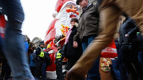 FILE PHOTO: West Midlands Police officers speak during patrols at the German Christmas Market in Birmingham, central England © Darren Staples