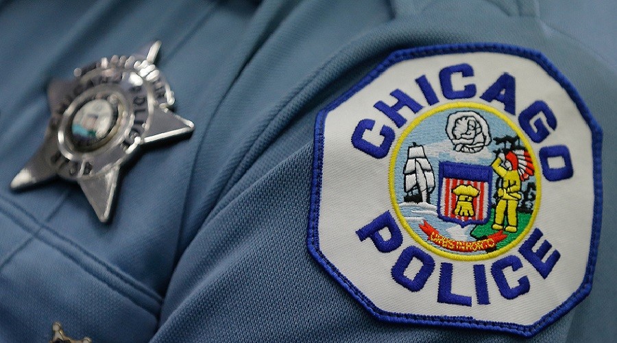 Off-duty Chicago officer stripped of powers after fatally shooting unarmed Hispanic man