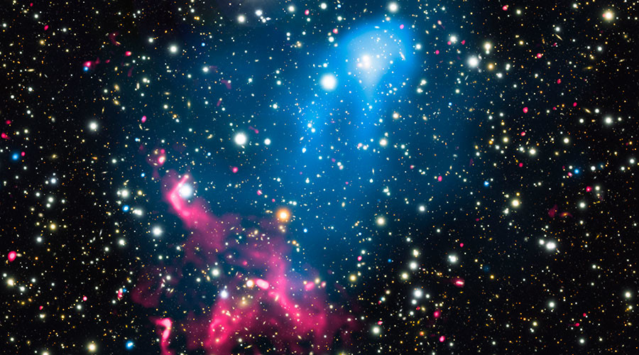 Colliding galaxy clusters meet supermassive black hole to create cosmic particle accelerator