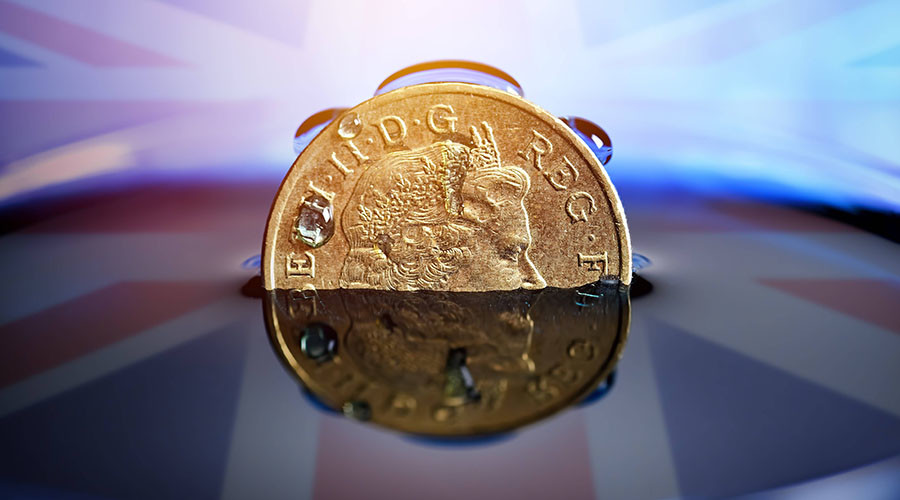 Sterling falls as May hints at hard Brexit, European stocks dip