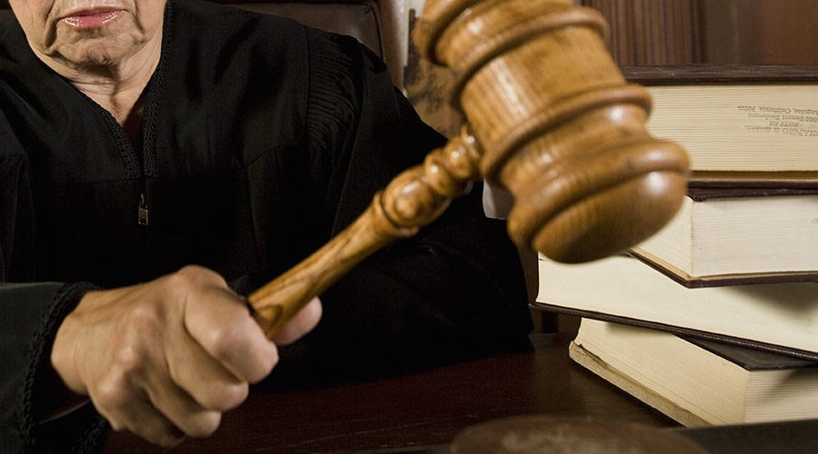 Judge who called ‘racist’ defendant ‘a c**t’ cleared of misconduct
